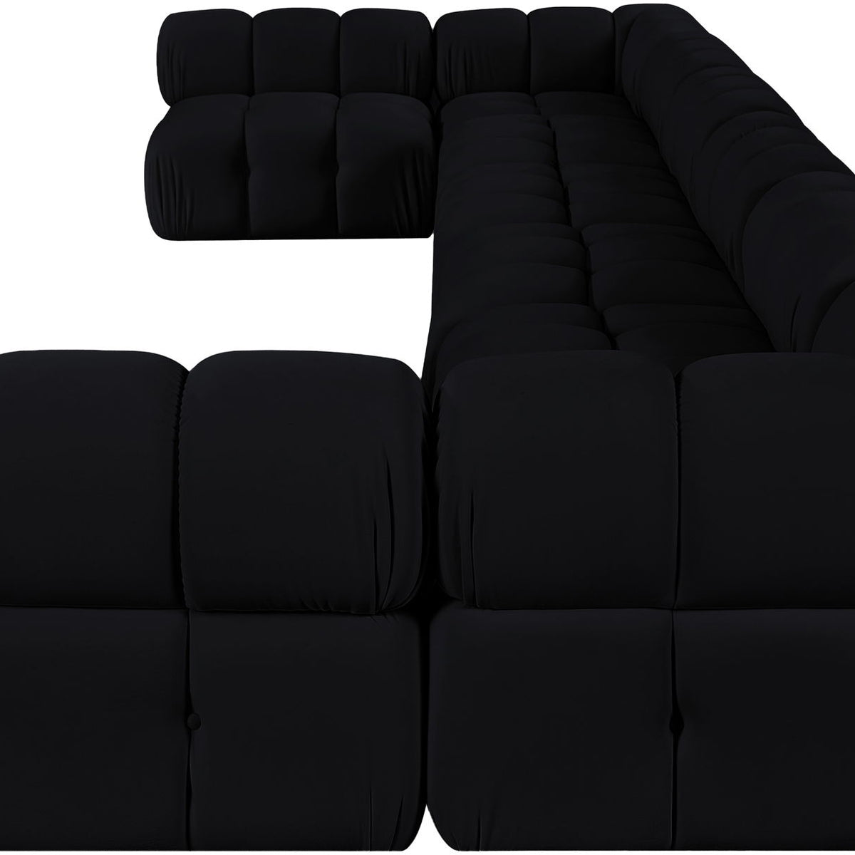 Black modular sectional sofa with tufted cushion blocks and rounded chaise corner