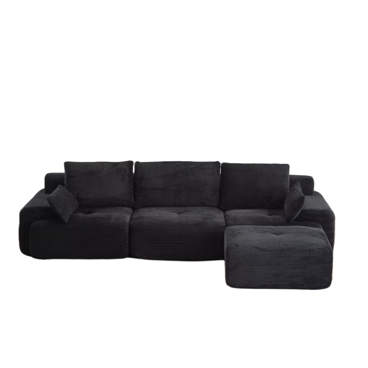 Black sectional sofa with chaise, padded arms, and three back cushions