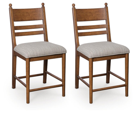 Set of 2 light brown upholstered barstools with padded seats and slatted backs