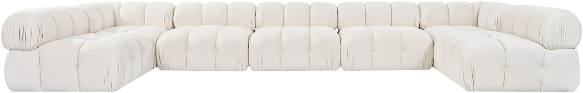 White U-shaped modular sectional sofa with tufted square cushions and rounded armrests