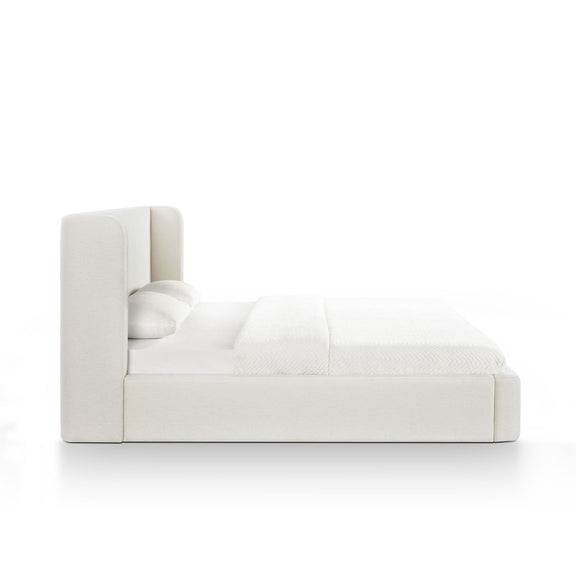 Upholstered platform bed with tall headboard, white fabric frame and two-tone cushioning