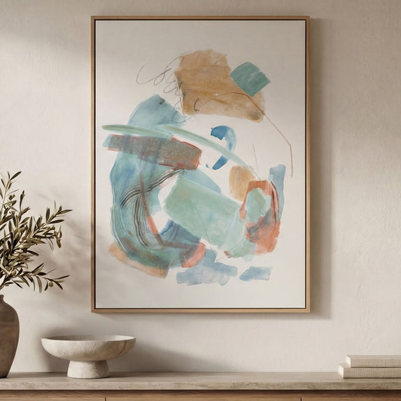 Multicolor abstract framed painting on wall, gold frame with blue, teal, and tan marks