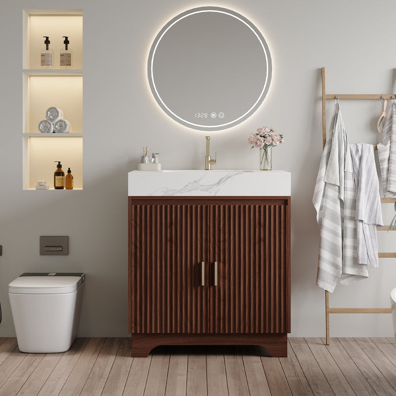 Walnut vanity with fluted doors and white marble-look sink top in a bathroom setting