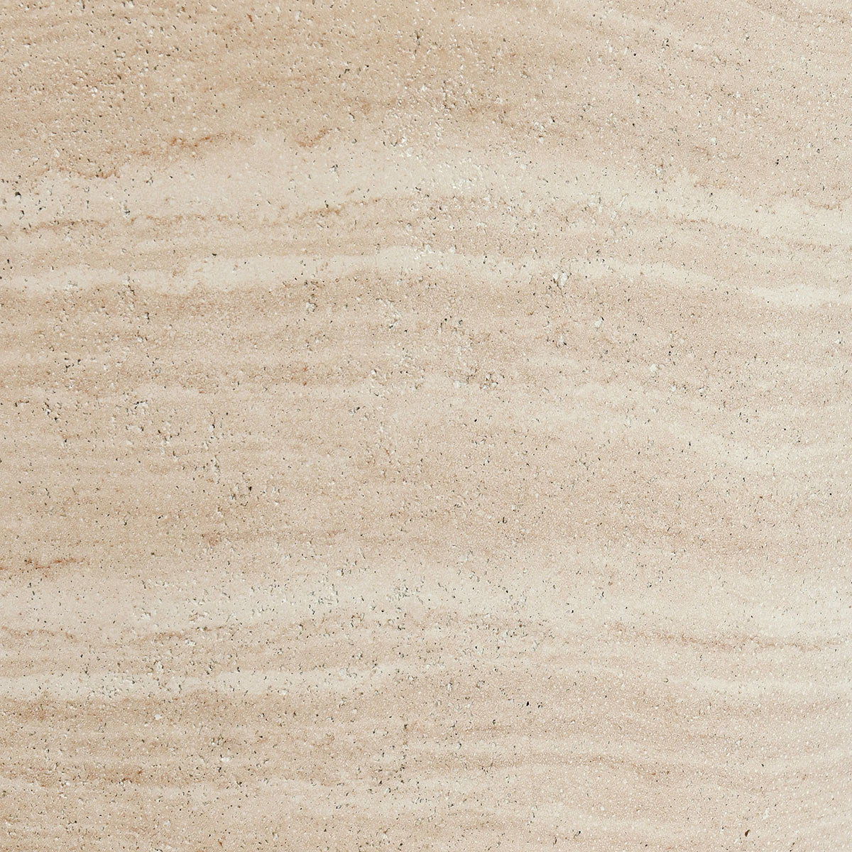 Outdoor round concrete table top, travertine finish showing speckled aggregate detail.