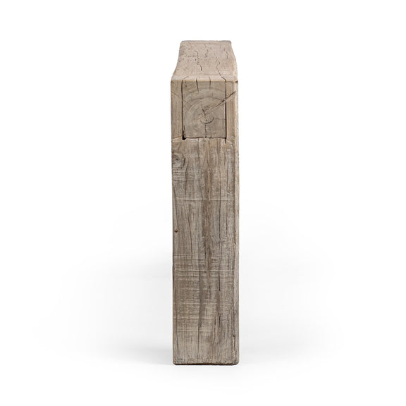 Console table end view with tall turned wood legs and beveled top