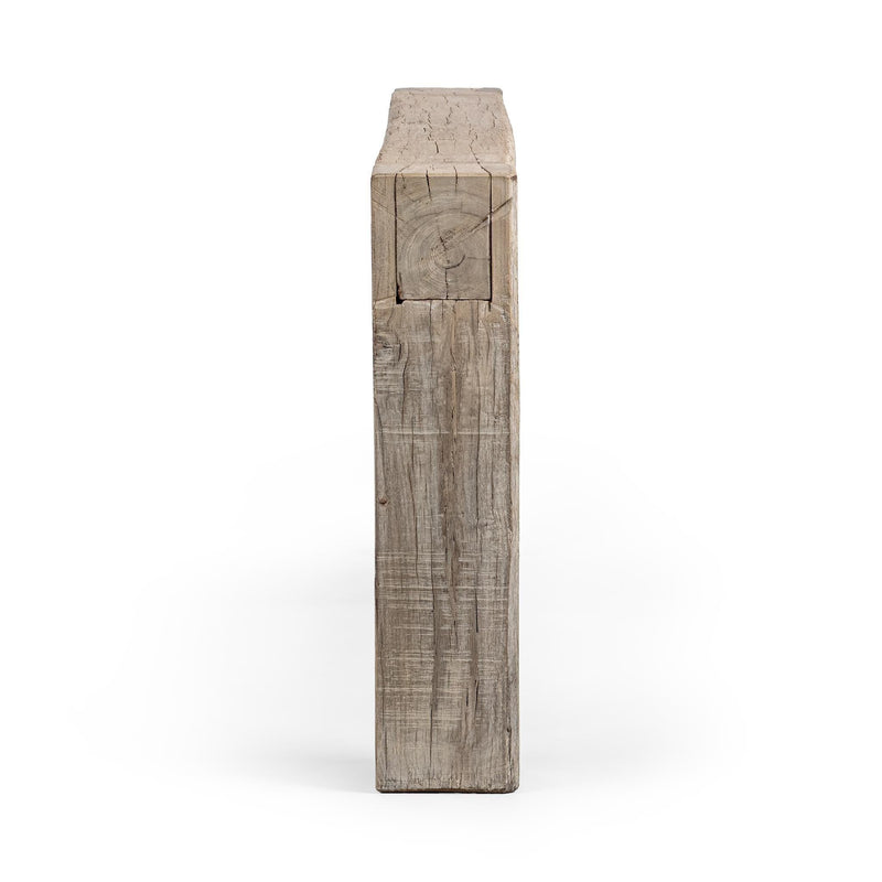 Console table end view with tall turned wood legs and beveled top