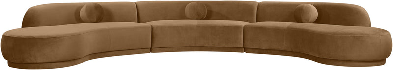 Brown velvet upholstered sectional chaise with curved back and rounded seat cushions