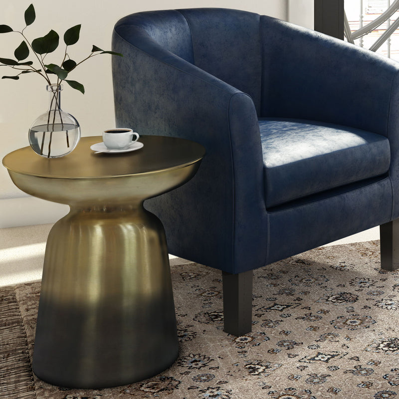 Gold and black ombre metal accent table with round top and tapered pedestal base