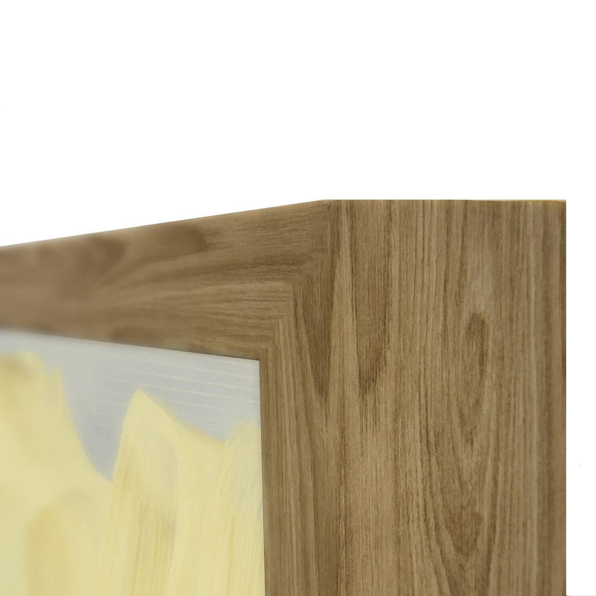 Abstract painting corner in light wood frame, showing white and pale yellow brushstrokes