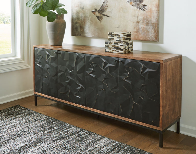 Accent cabinet with black geometric front doors, brown wood sides, and long metal legs