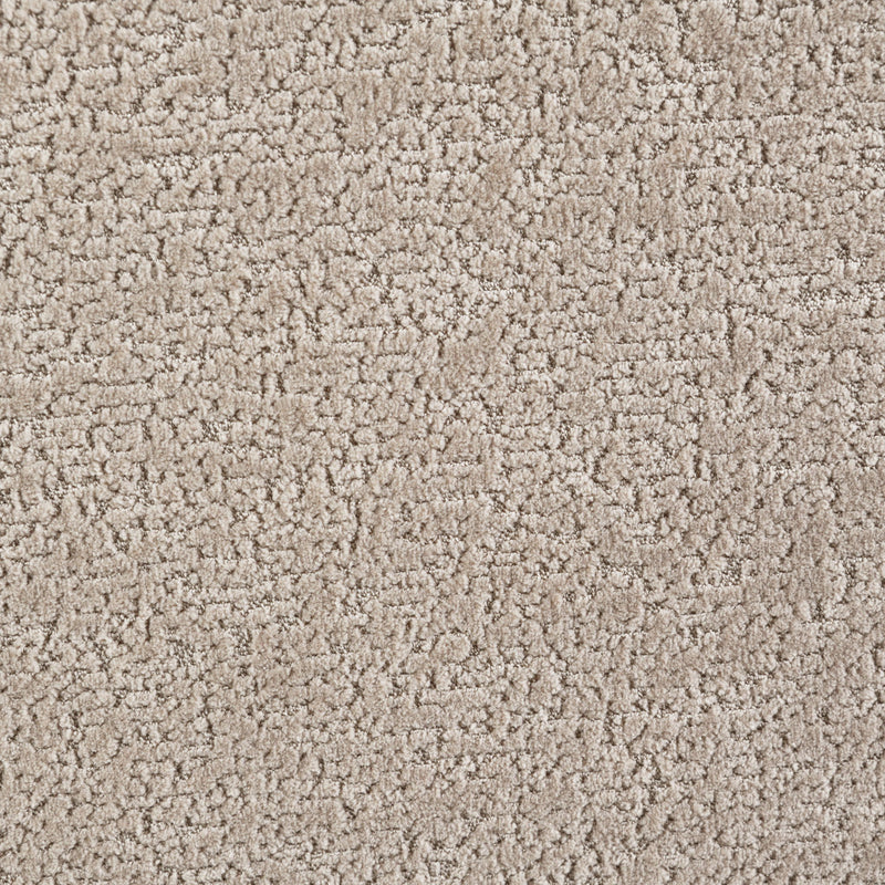 Close-up of beige textured fabric upholstery