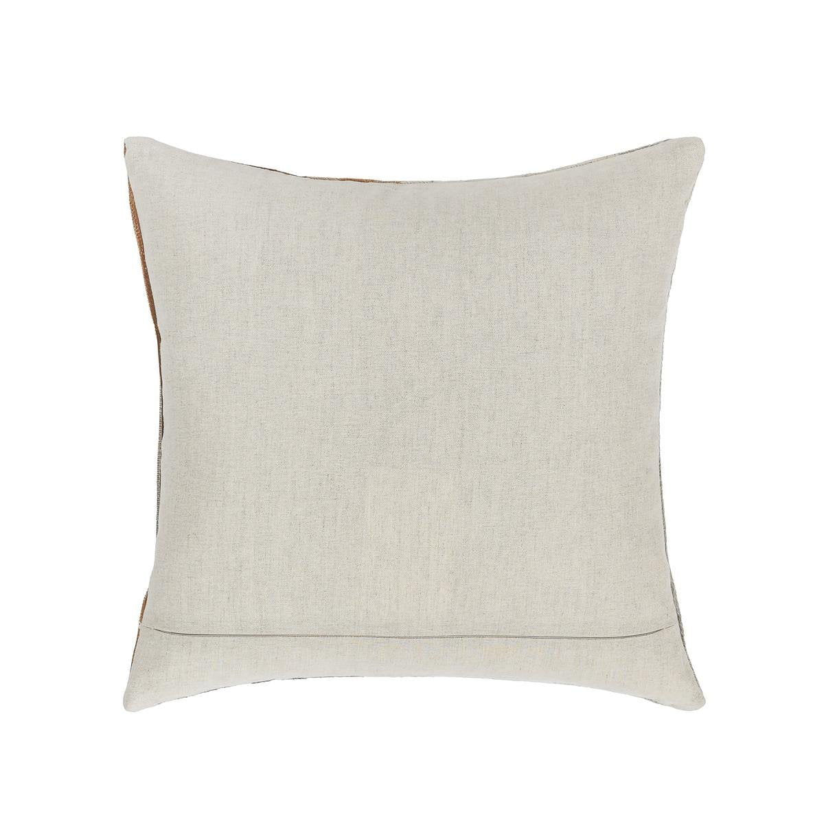 Cream hide pillow with simple square shape and subtle stitched border