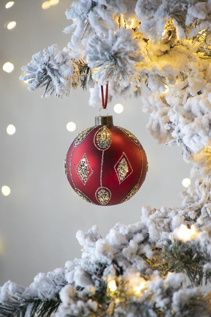 Red and gold decorative hanging Christmas ball ornament with detailed diamond accents