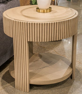 Light brown ribbed round side table with lower shelf