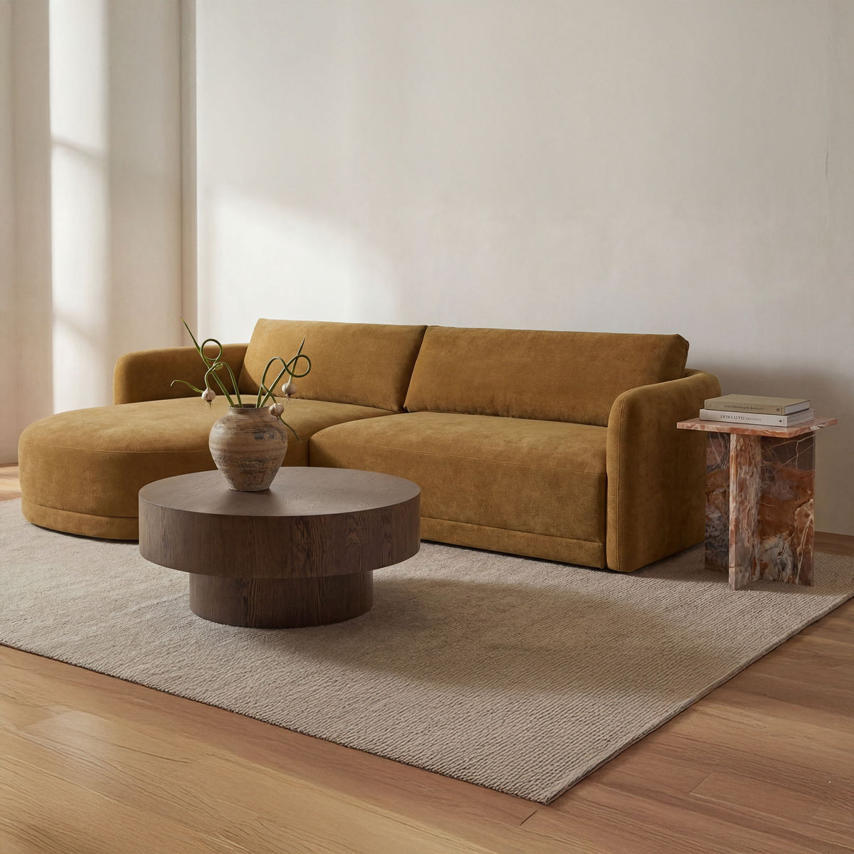 Round dark brown wood coffee table on short pedestal base