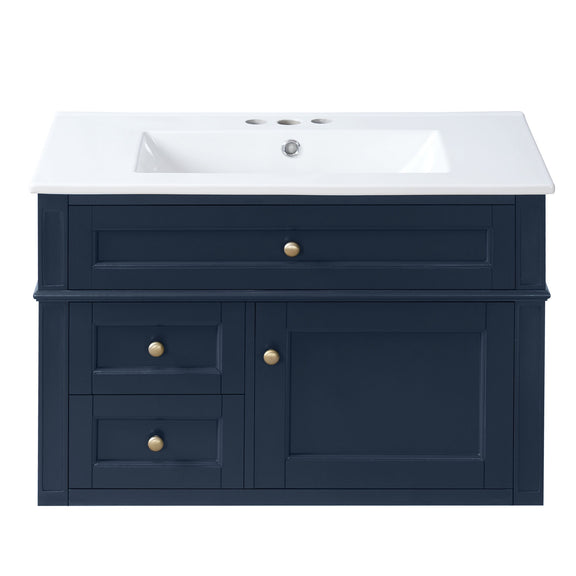 Blue wall-mounted bathroom vanity with white sink, two drawers, tip-out drawer and cabinet door.