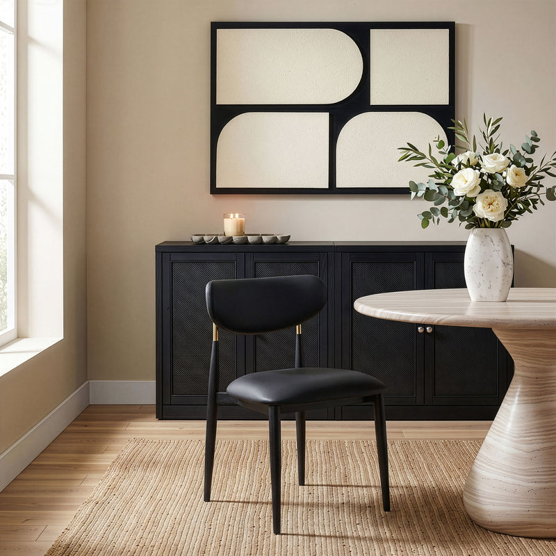 Dining side chair with black upholstered seat and back, black legs