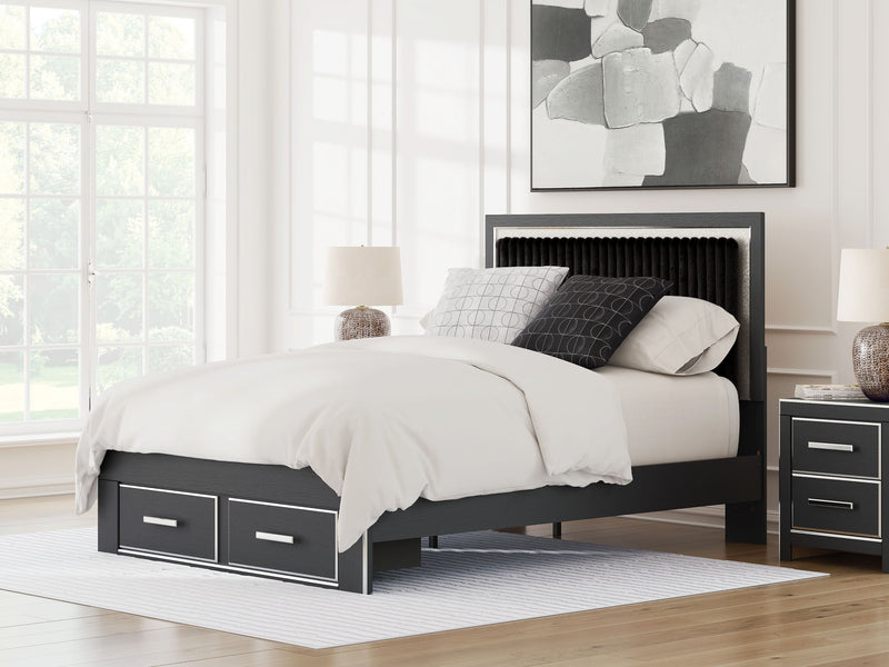 Upholstered panel storage bed in a living room, black frame with 2 drawers, white bedding