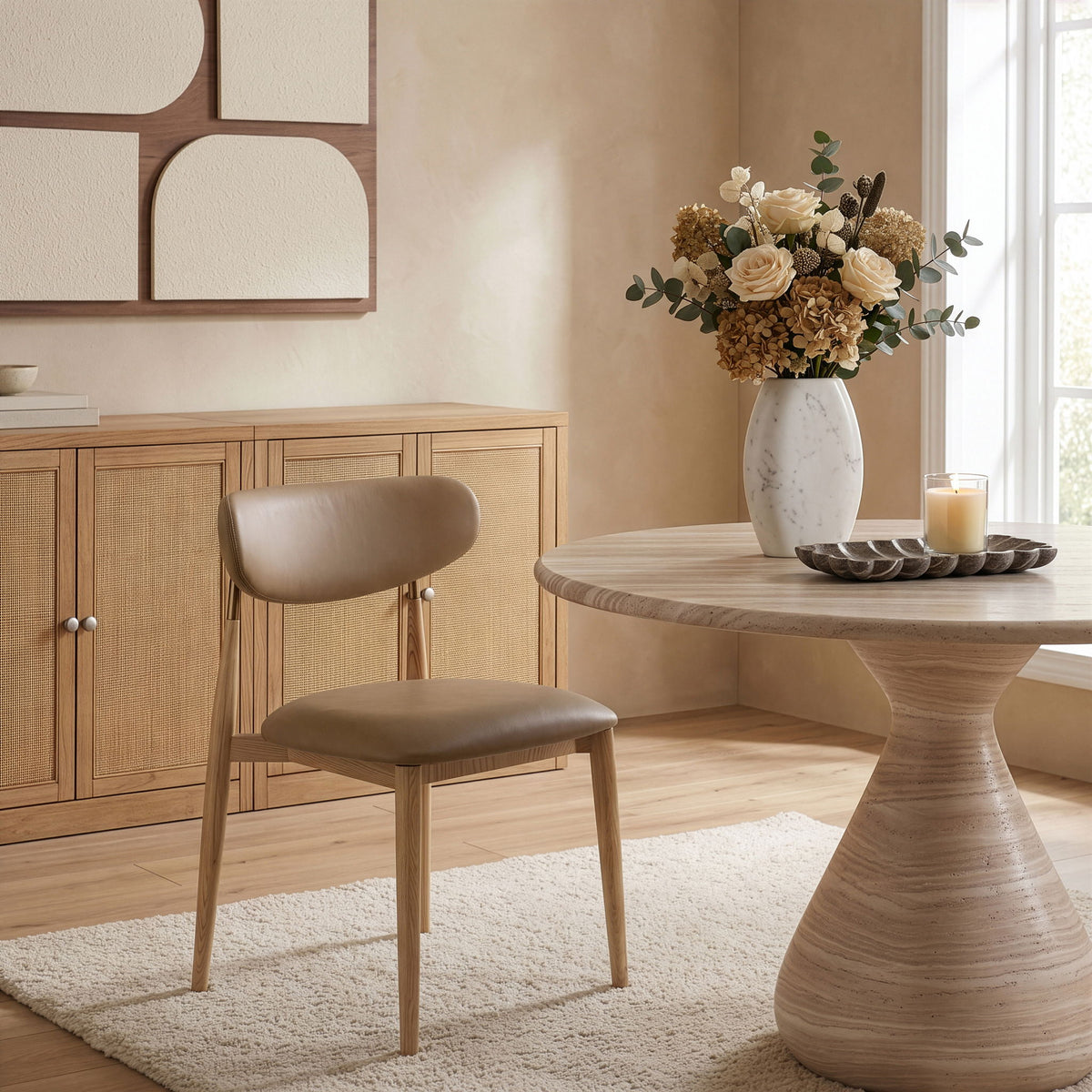 Vegan leather dining side chair with gray cushioned seat and light wood legs