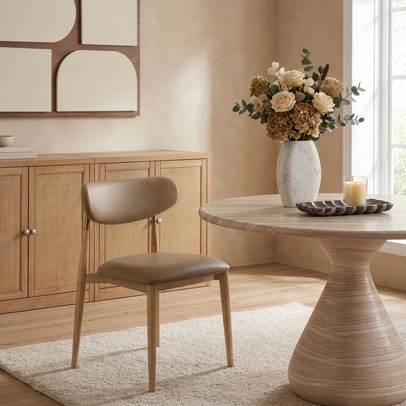 Vegan leather dining side chair with gray cushioned seat and light wood legs