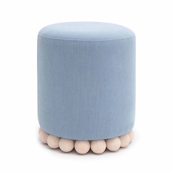 Light blue upholstered fabric ottoman with rounded wooden ball base