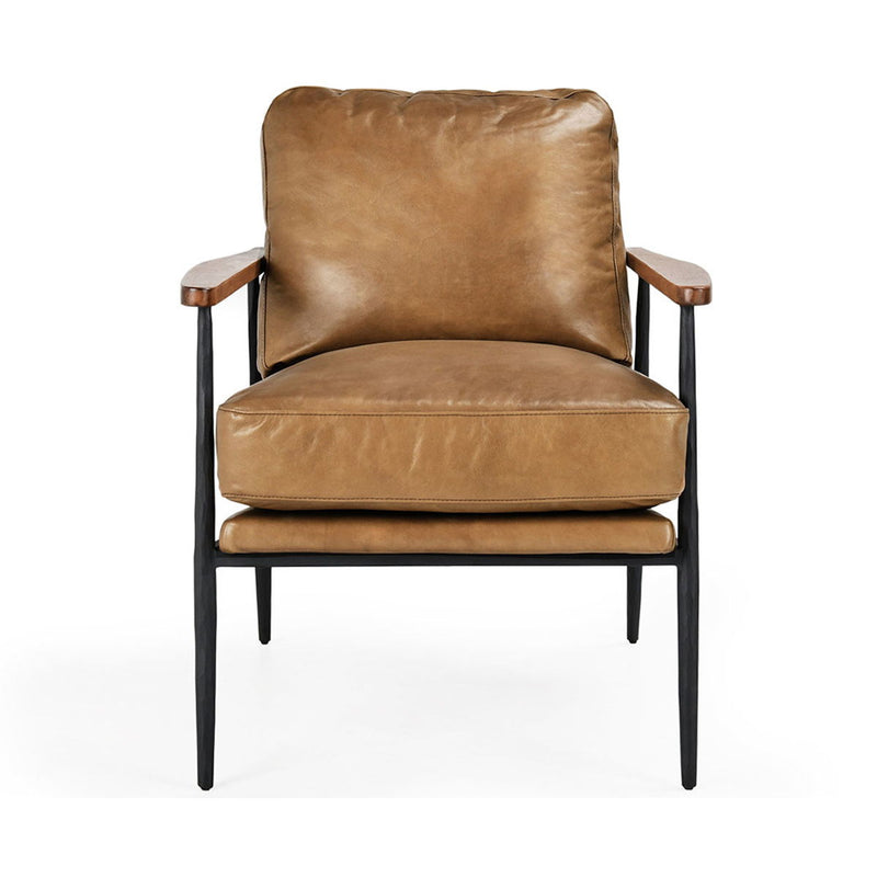 Tan leather club chair with cushioned seat and curved backrest