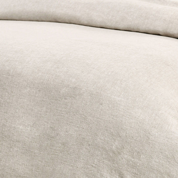 Beige linen-look duvet fabric close-up with fine textured weave