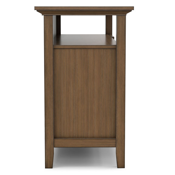Aged brown tall media stand with open shelf and cabinet door storage