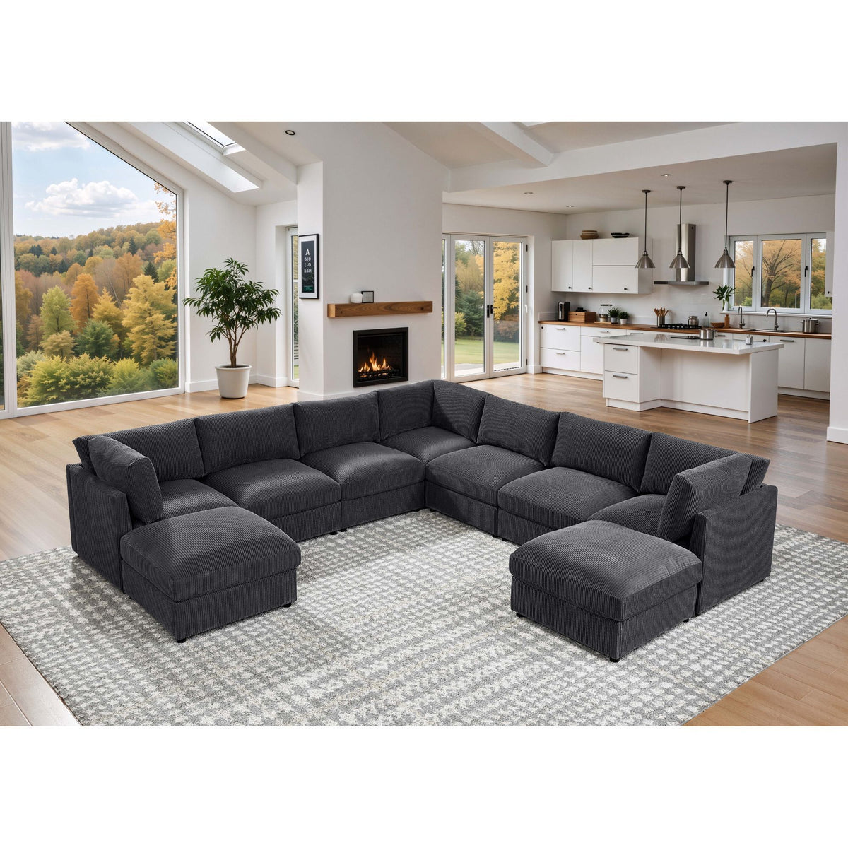 Dark gray modular sectional sofa with two ottomans, curved chaise corner setup