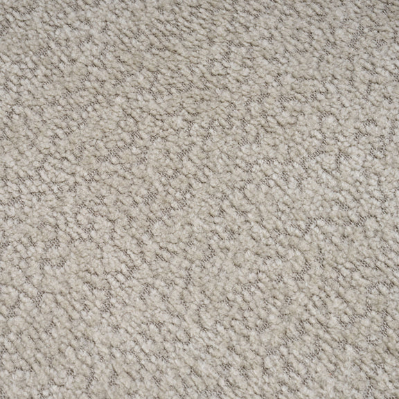 Beige loveseat upholstery fabric close-up, dense textured weave