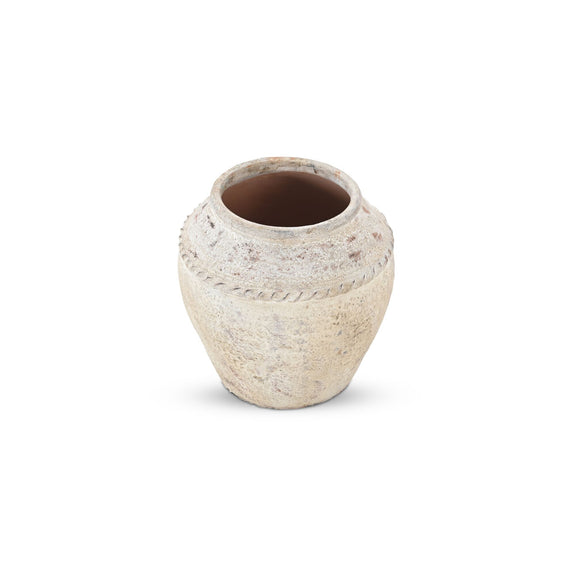 White clay pot with rounded shape and wide open top