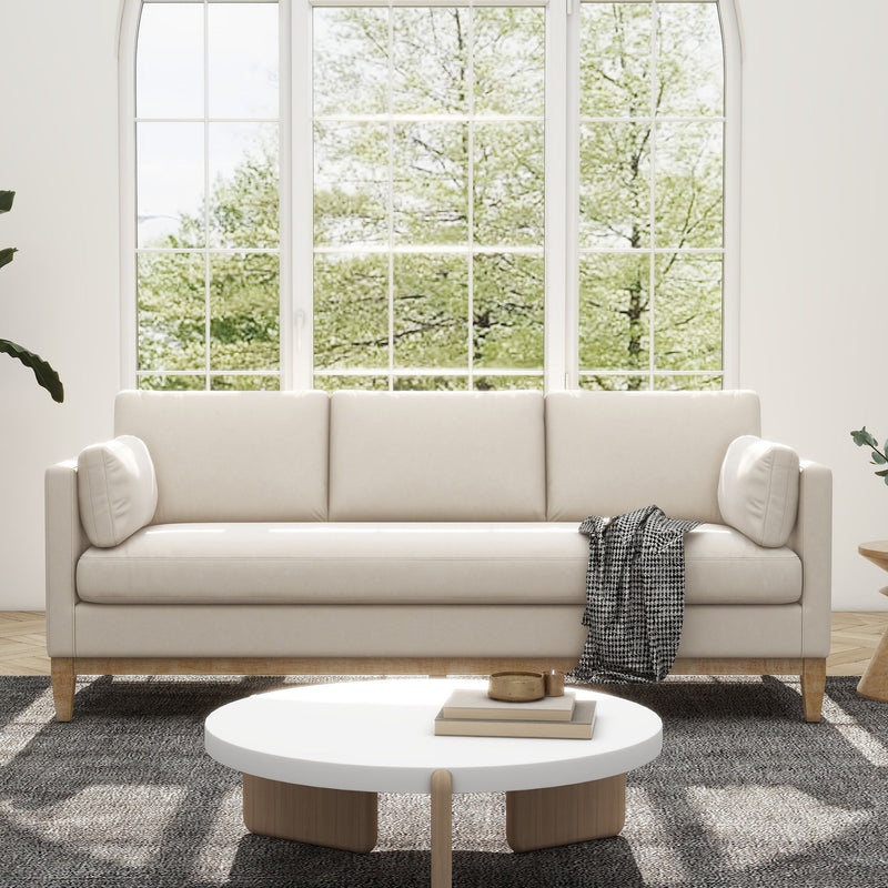 Cream modern farmhouse sofa with rounded arm caps and three back cushions.