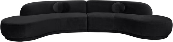 Black velvet sectional sofa with curved arms and deep seat cushions