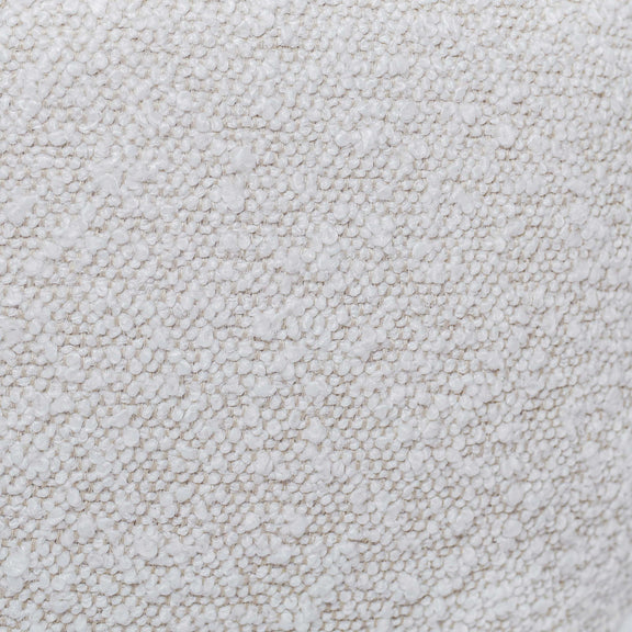 Close-up of white boucle-style fabric texture on a Boba pillow