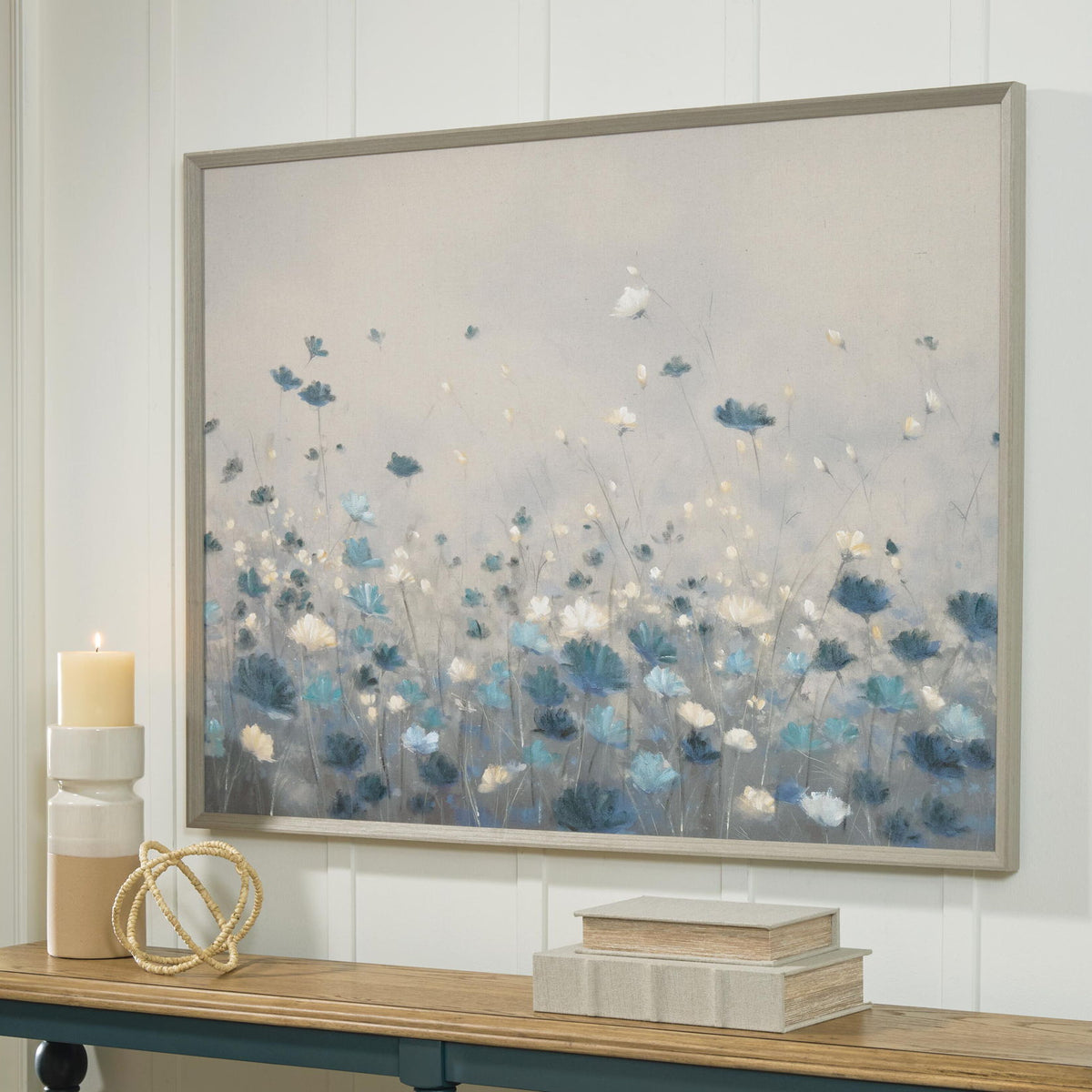 Framed floral wall art with blue and white flowers, light gray backdrop