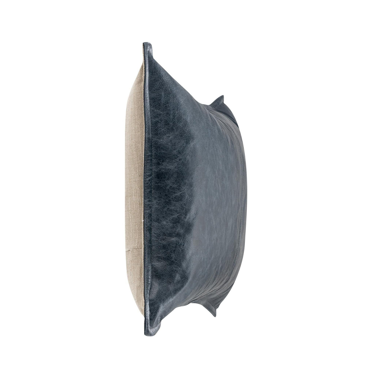 Navy leather lumbar pillow shown from the side with stitched seam detail.