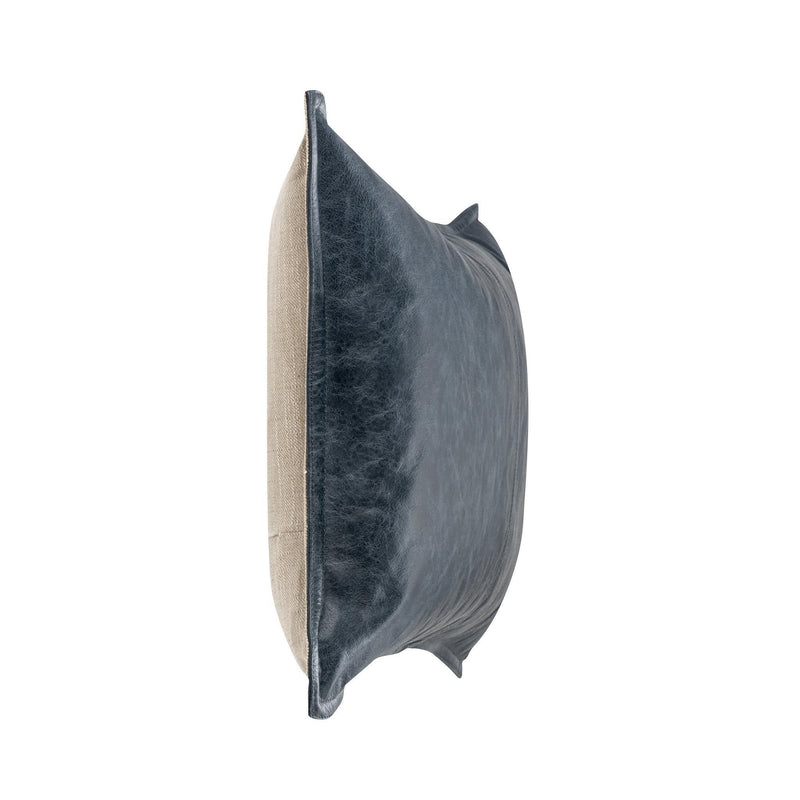 Navy leather lumbar pillow shown from the side with stitched seam detail.