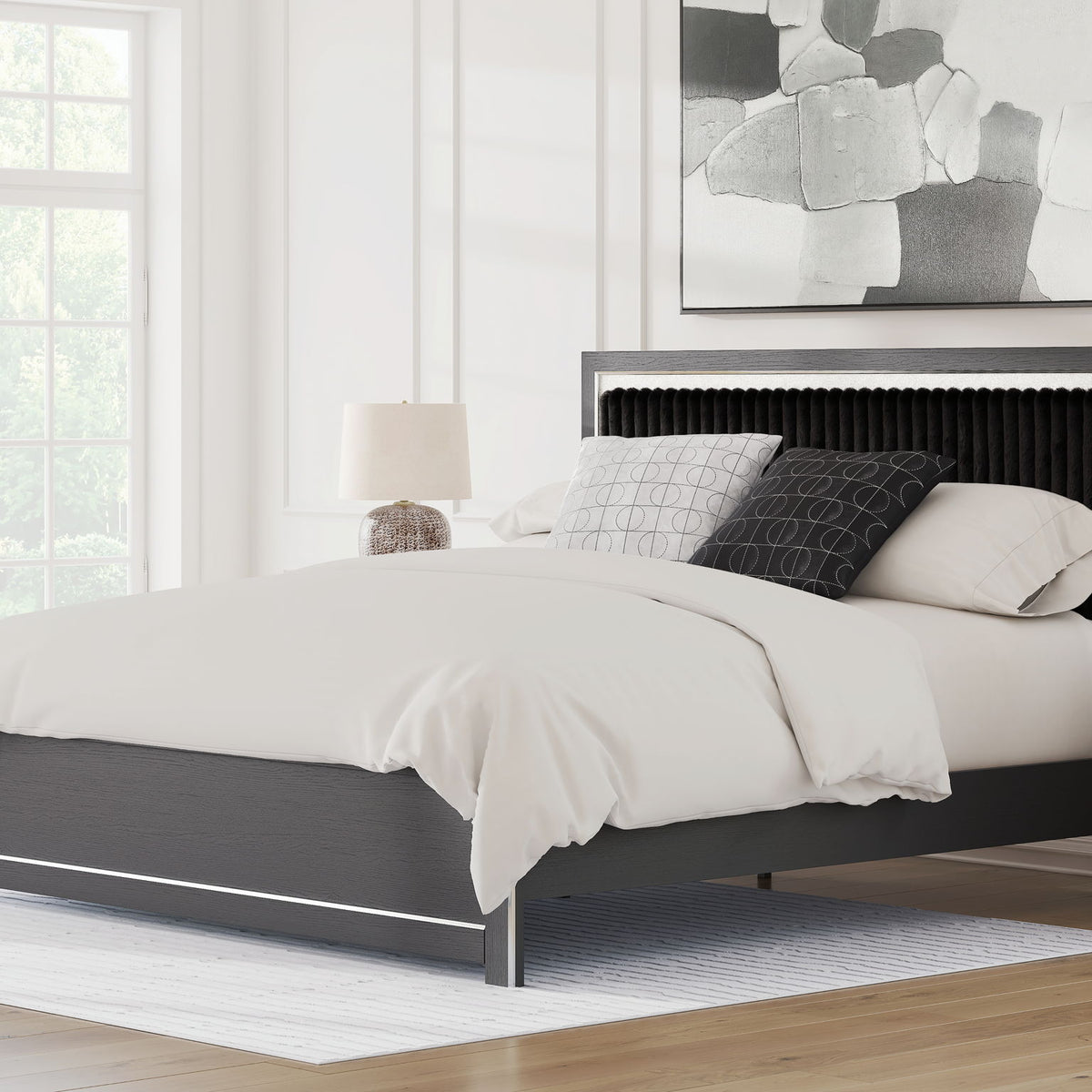 Upholstered platform bed with roll slats, dark frame with black upholstered headboard