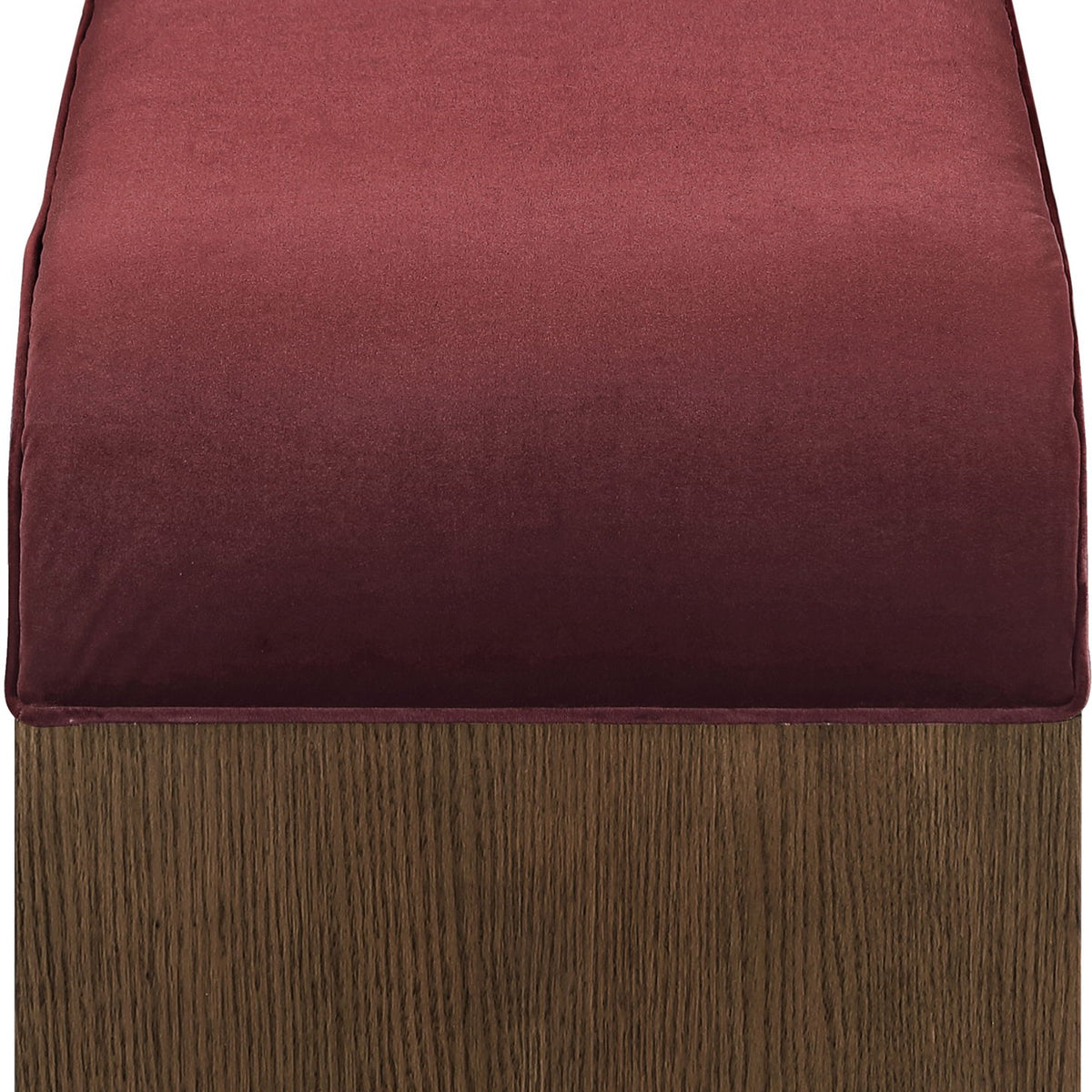 Velvet seat cushion in burgundy on a dark wood bench base