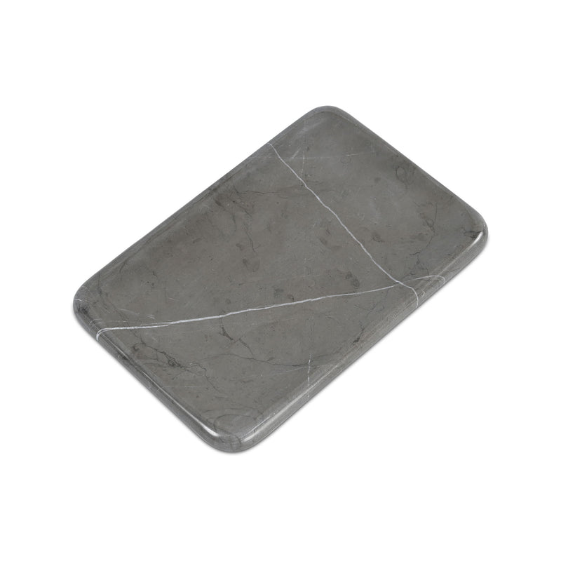 Gray marble catchall tray with diagonal white veining and beveled corners