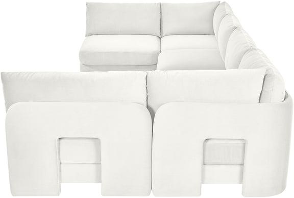 White velvet armless sectional sofa close-up with padded seat and back cushions