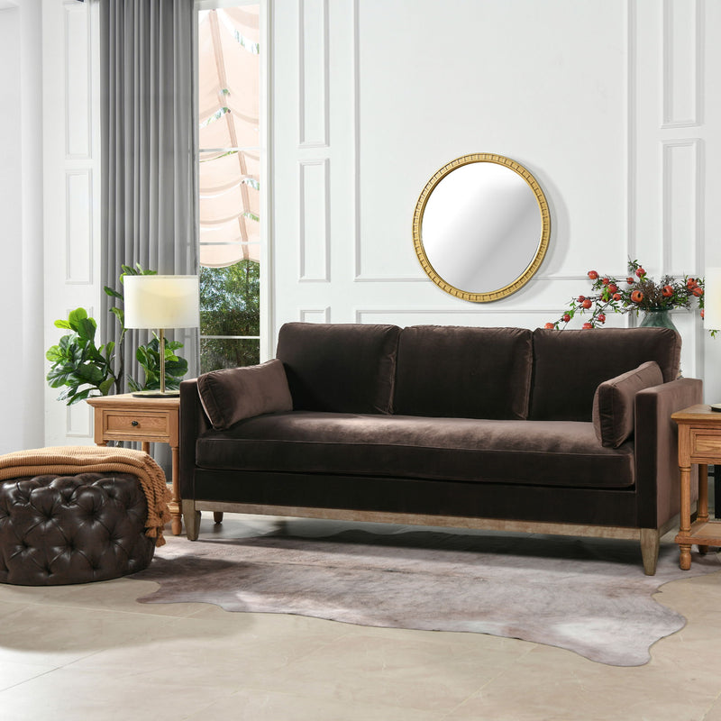 Dark brown modern farmhouse sofa with three back cushions and wooden legs.