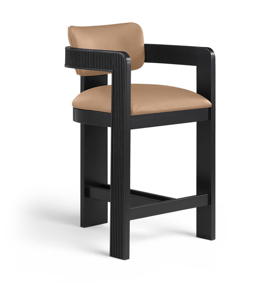Light brown vegan leather counter stool with padded seat, fluted back panel, black frame