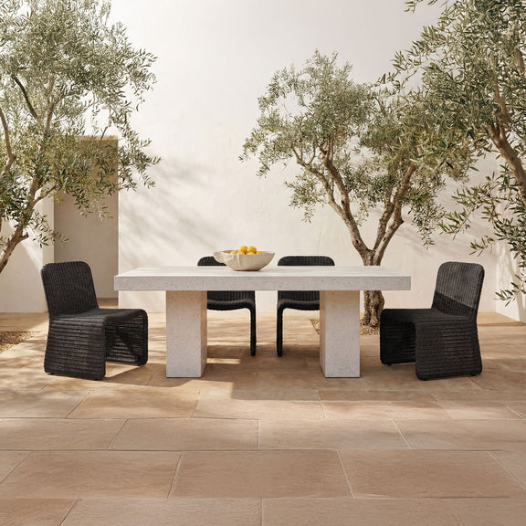 Two charcoal outdoor dining chairs with ribbed woven seats and backs, with armrests