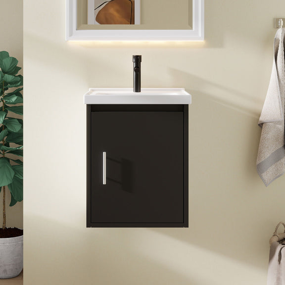 Wall-mounted bathroom vanity cabinet with ceramic sink, dark cabinet door and white countertop