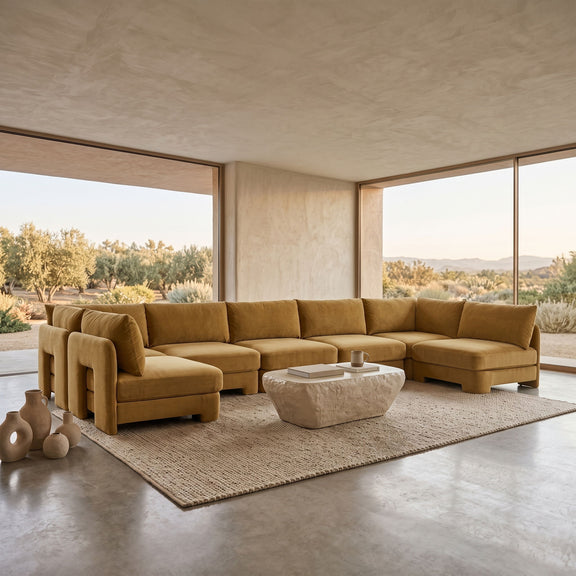 Camel velvet performance fabric U-shaped armless sectional with corner and chaise sections.