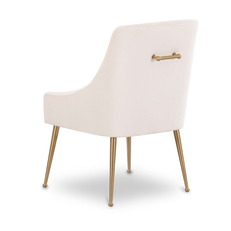 Ivory velvet side chair with gold-toned handle detail and gold-toned metal legs