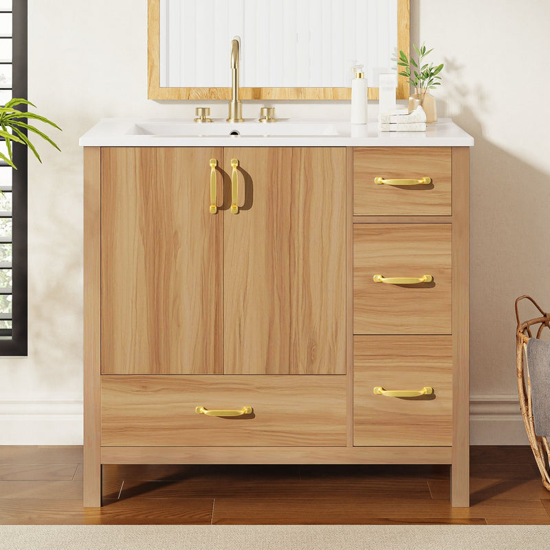 Bathroom vanity with acacia wood finish, gold handles, white countertop and three drawers