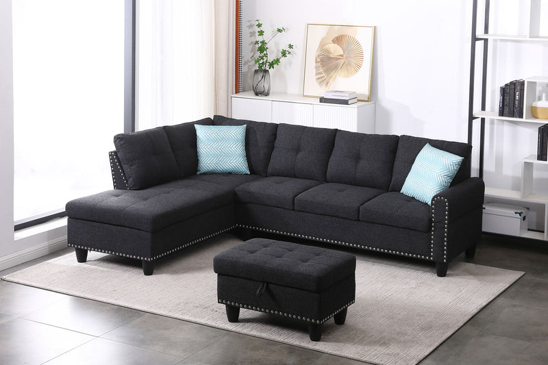 Dark gray sectional sofa with left-facing chaise and ottoman, two blue accent pillows