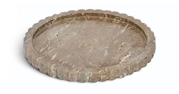 Gray travertine tray with scalloped rim, round shallow surface.